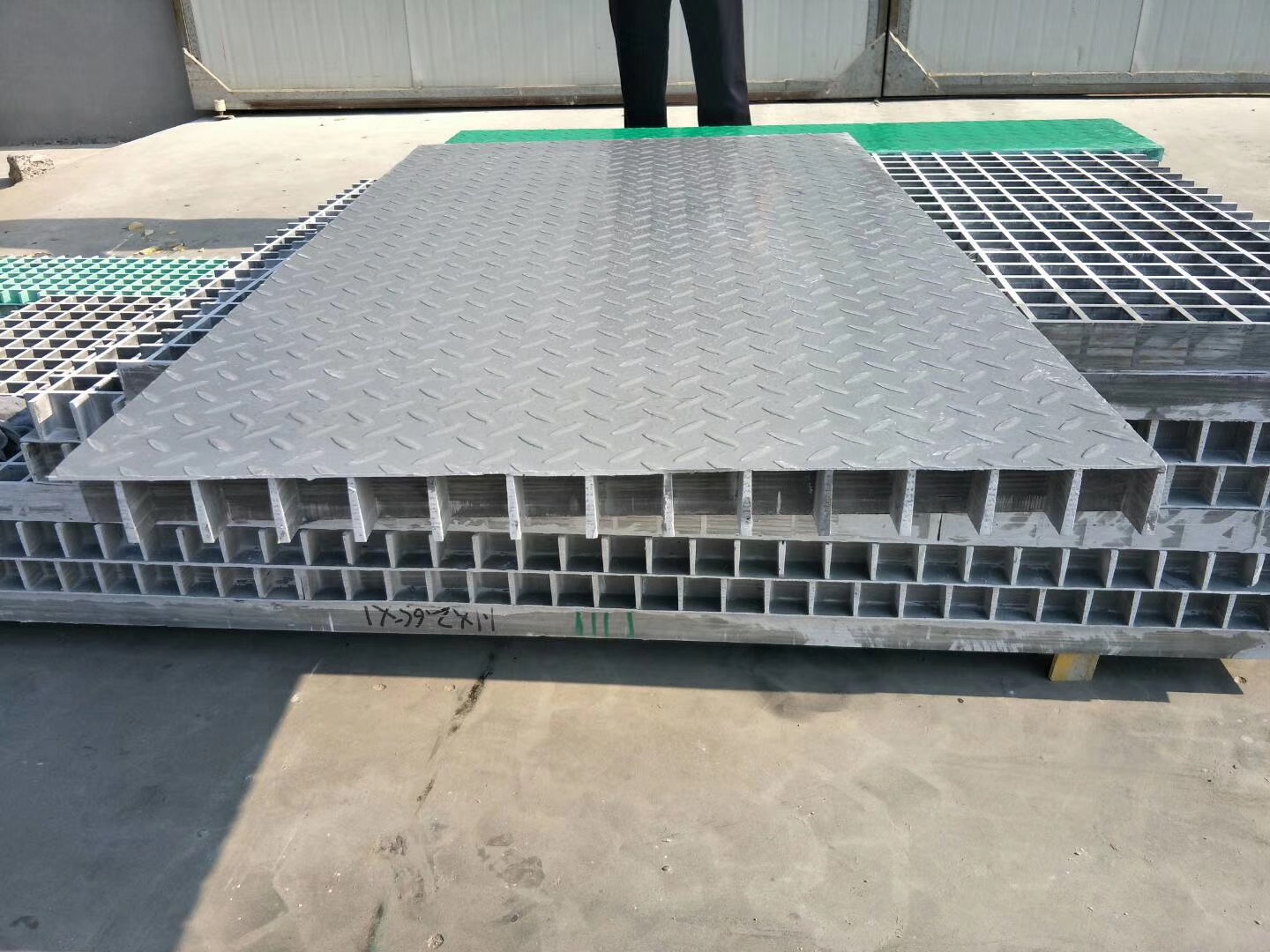 FRP trench cover surface for drainage and wheel traffic review