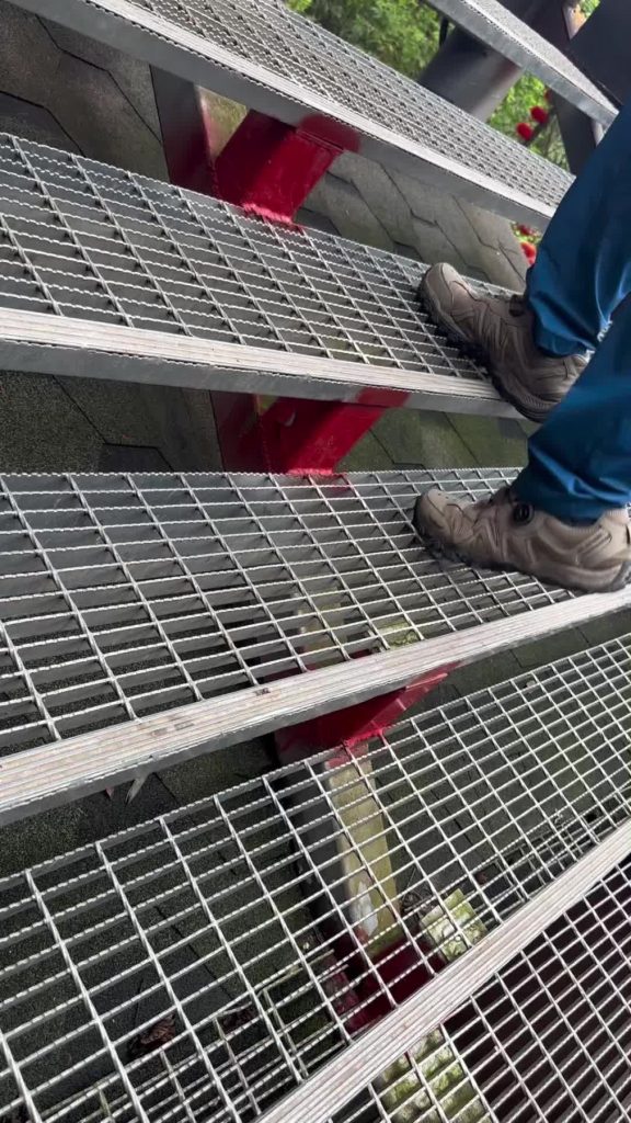 Serrated grating used on outdoor access stairs and walking areas