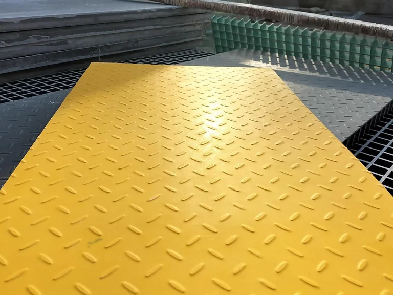 Yellow FRP trench cover panel with anti-slip walking surface