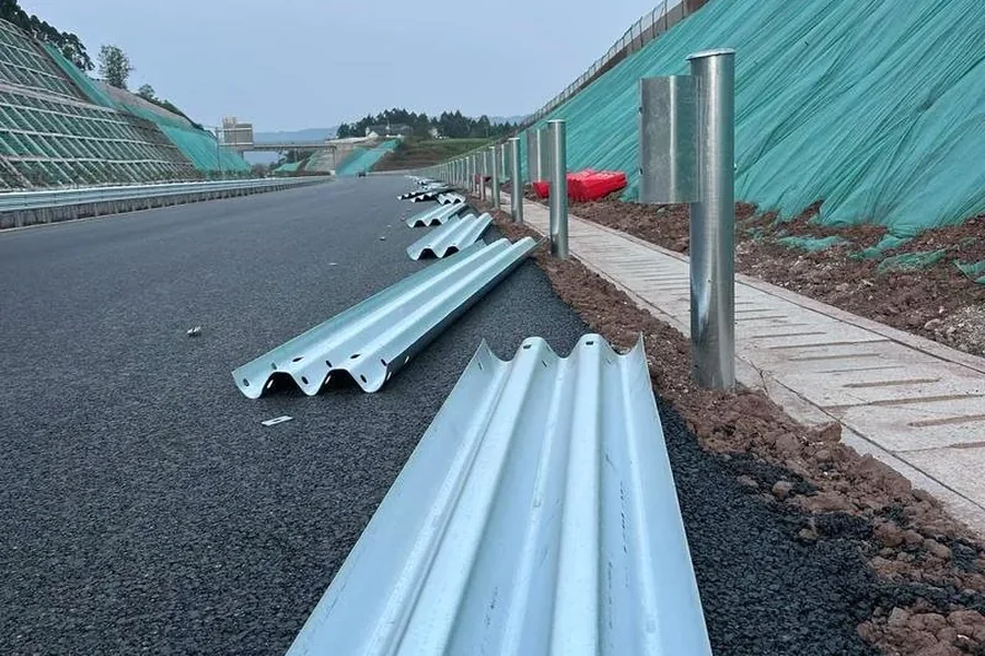 Highway guardrail beams and posts prepared for installation