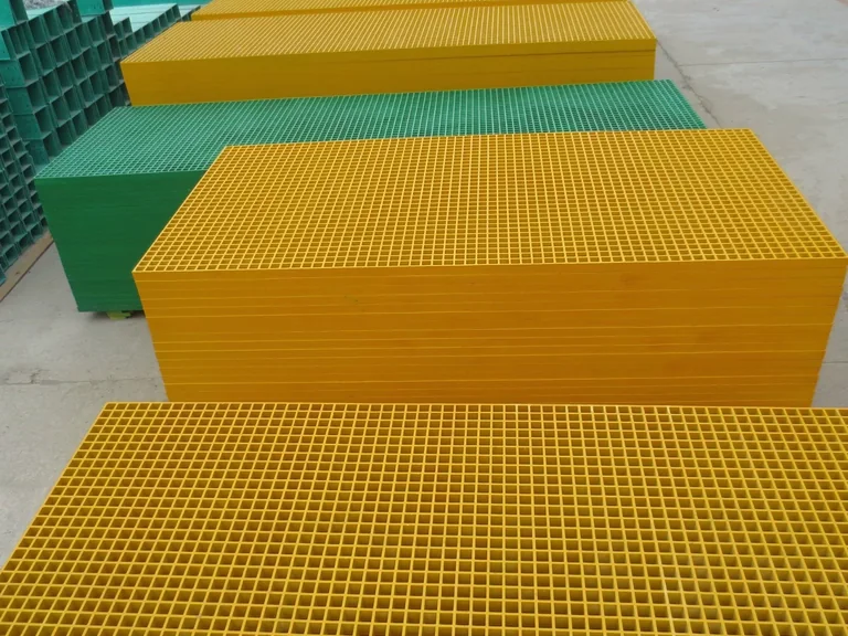 Stacked molded FRP grating panels prepared for project cutting