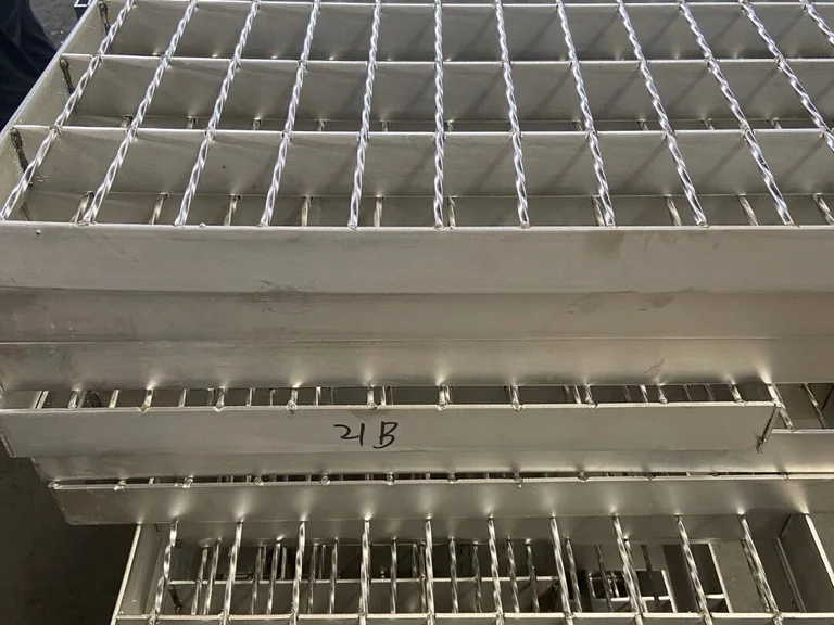 Stainless steel grating panels prepared for inspection